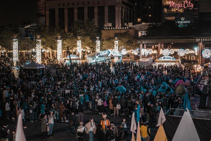 people in a street during night time